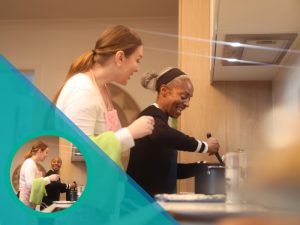 an elderly women with a professional cooking happily indicating household management skills