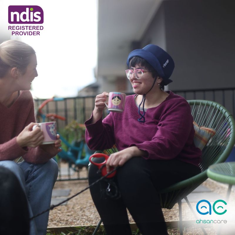 NDIS support worker assisting a participant with daily living and personal care.