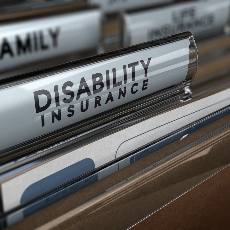 Registered NDIS provider disability insurance file organised in an office filing system for participant support documentation.