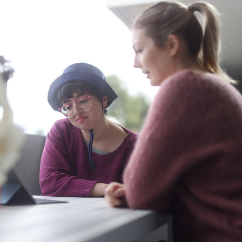 A support worker arriving at an apartment in Burwood