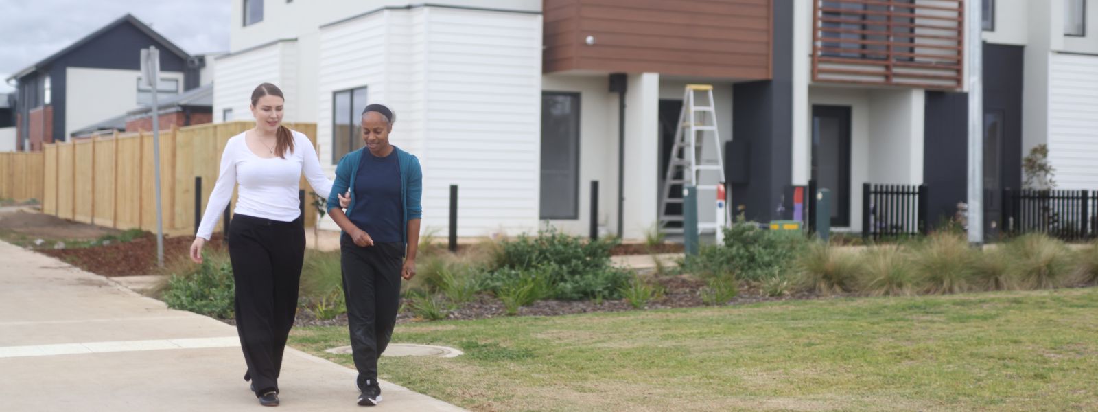 NDIS support worker helping a participant at home in Canterbury-Bankstown