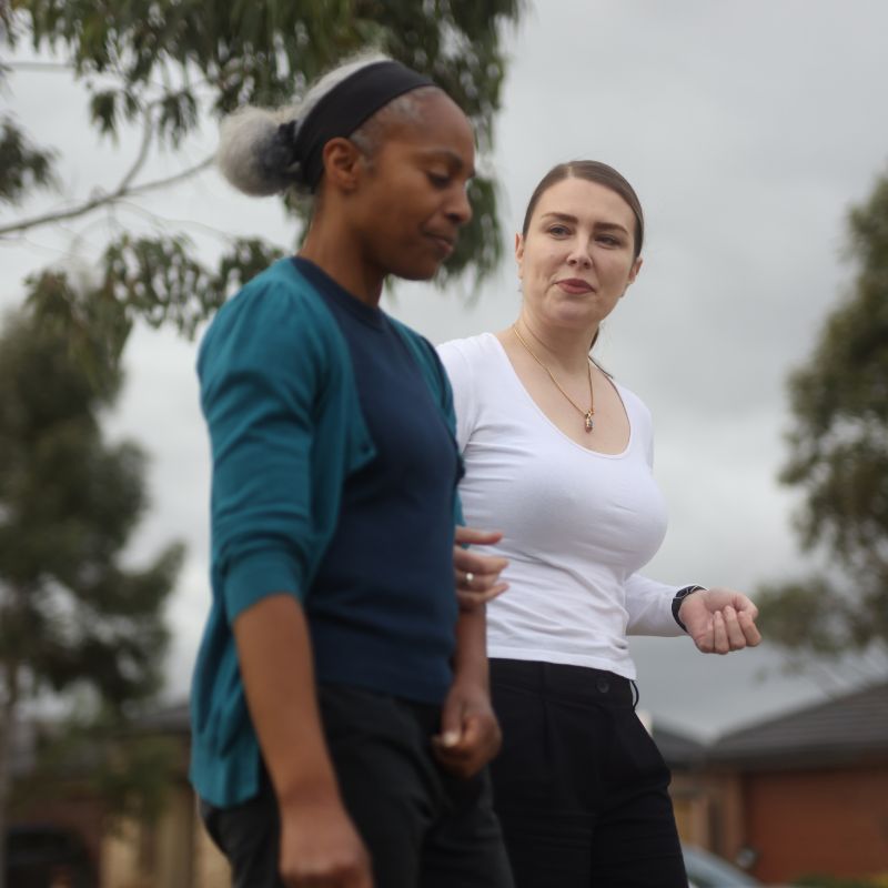 Support worker and participant talking together in a Ku-ring-gai home