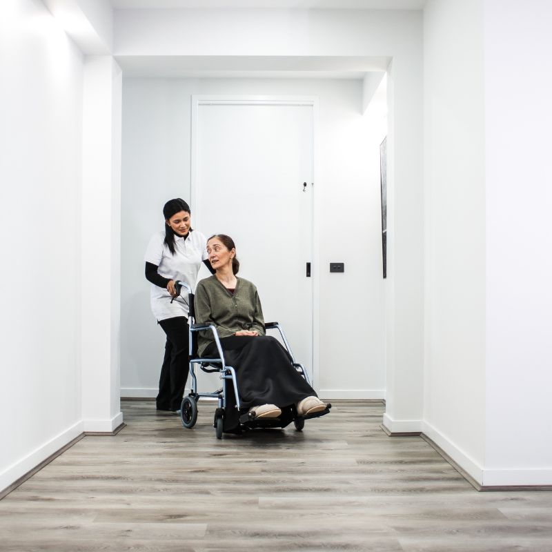 A support worker talking through a roster with an NDIS participant on the Mornington Peninsula