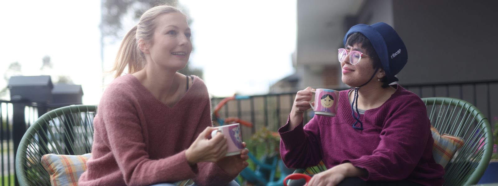 Support worker with an NDIS participant at home in Darebin